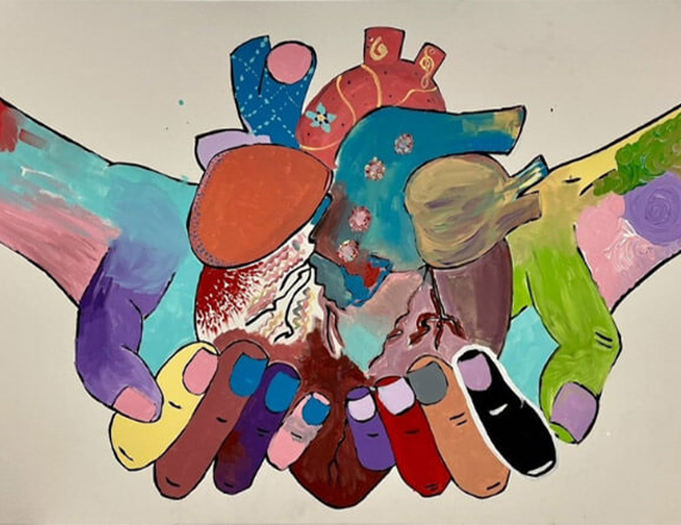A multicolored pair of hands holding a multicolored heart