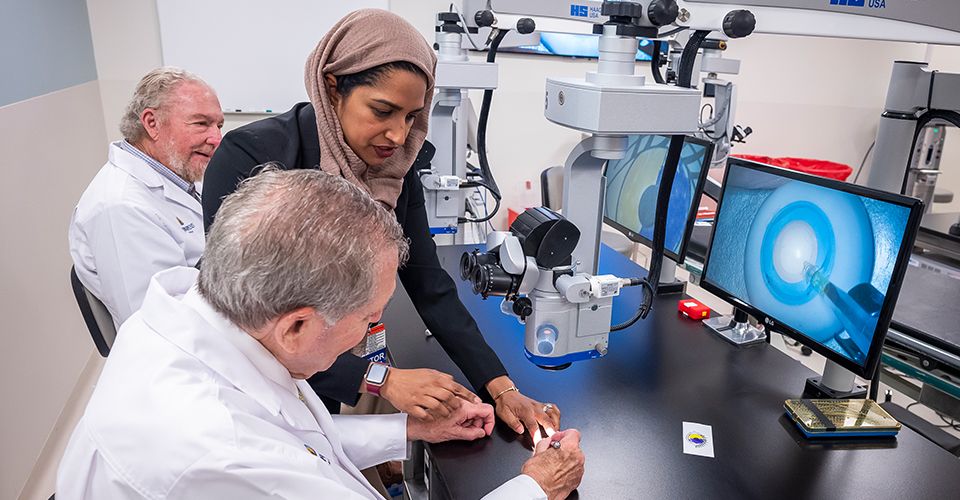 Shameema Sikder provides guidance for mock cataract surgery.