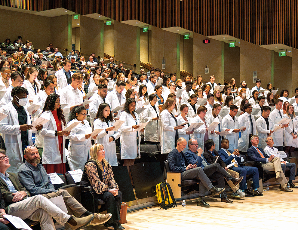 Graduate students recite the Oath of the Scientist during the 2023 Graduate Coating Ceremony.