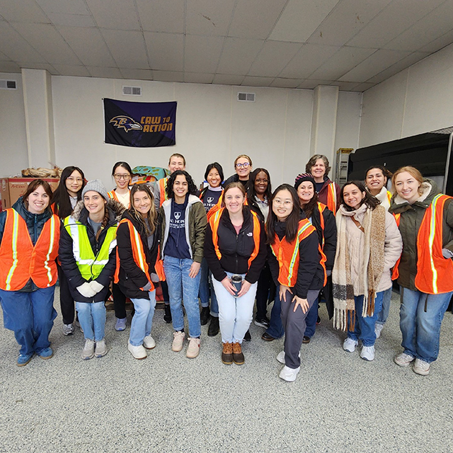 Students and staff from Johns Hopkins’ dietetic education programs volunteer at the food pantry run by City of Refuge.