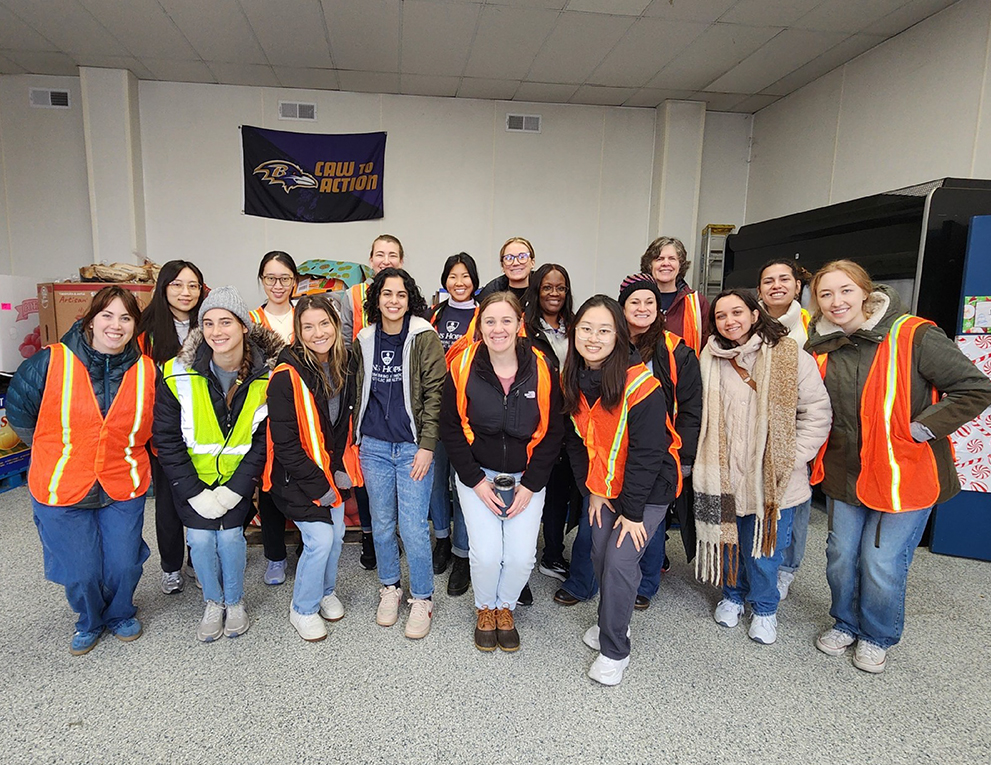 Students and staff from Johns Hopkins’ dietetic education programs volunteer at the food pantry run by City of Refuge.