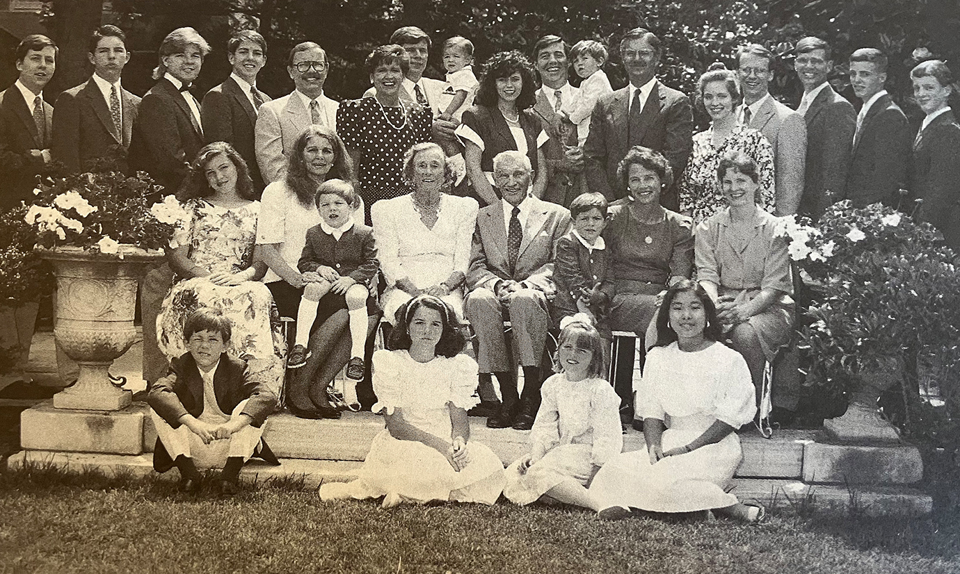 The Zubrod Family gathers in 1990 for the 50th wedding anniversary of C. Gordon and Kay Zubrod (center). Christine Zubrod Perrin is seated in middle row, with child on her lap.