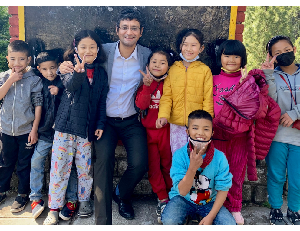 Kunchok Dorjee with smiling kids