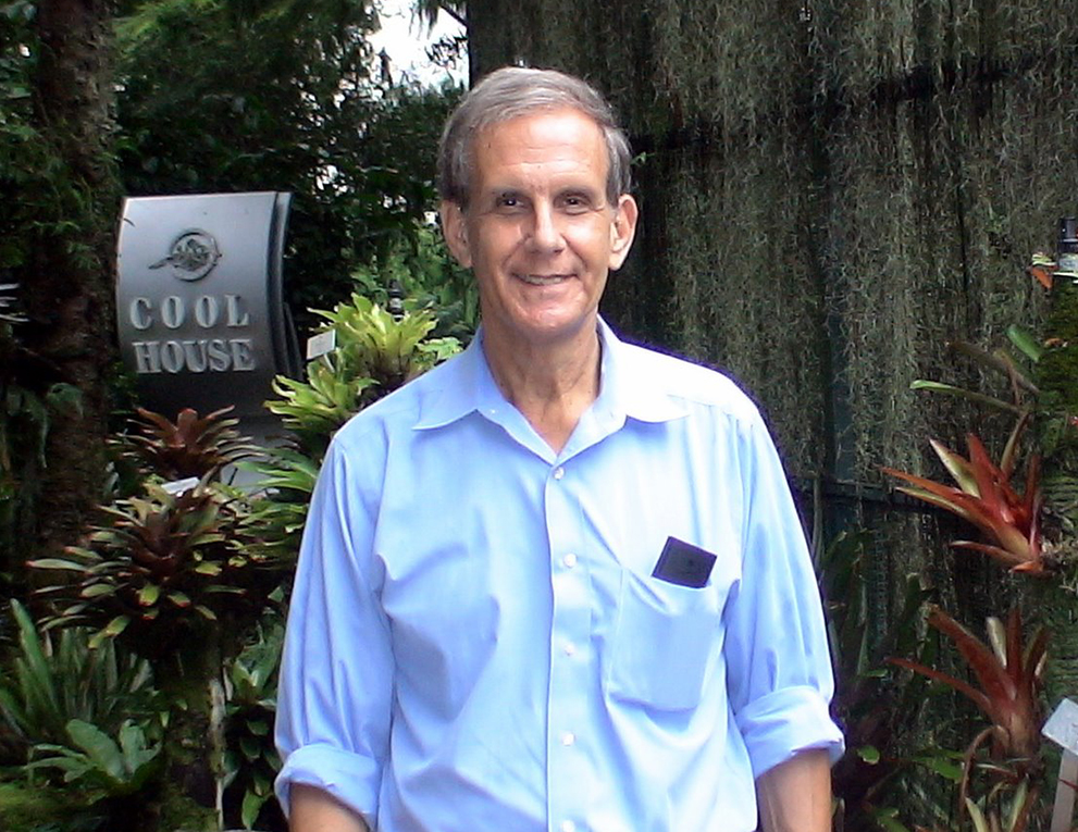 David Zee outside wearing a light blue button-down shirt