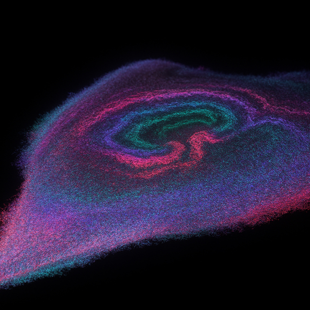 Glycolytic waves drive and fuel cancer cell migration. The image, captured with a high-powered microscope over 9-minute intervals, is color-coded from early to late time points showing wave activity (green, blue, purple, pink, red). Credit: David Huiwang Zhan