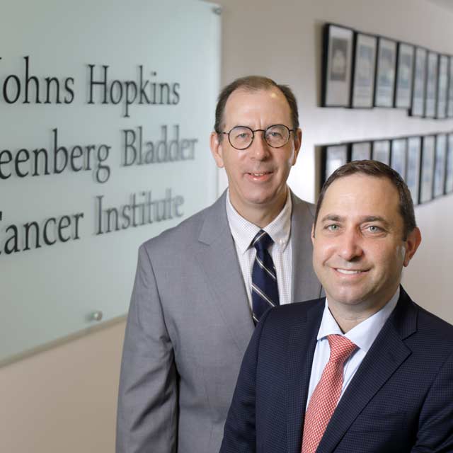 Medical oncologist Noah Hahn, M.D., and urologist Max Kates, M.D.