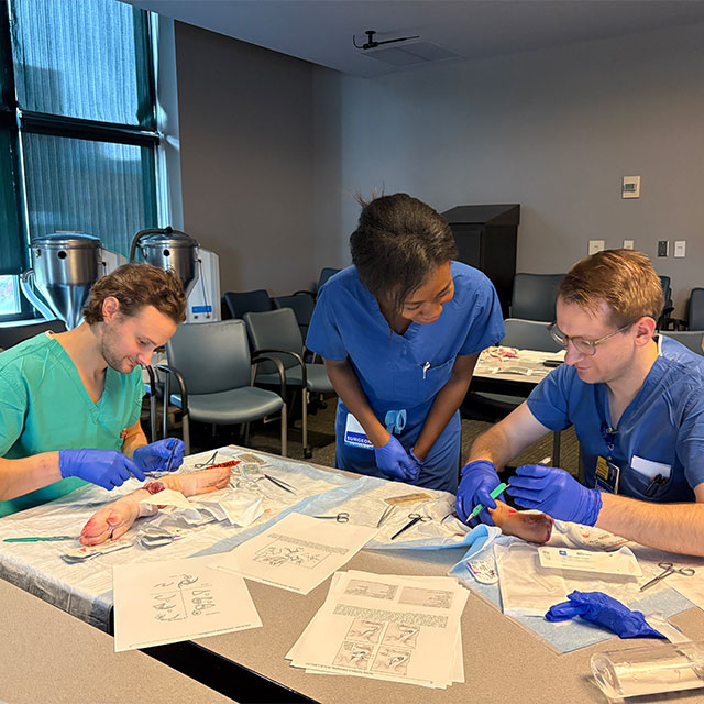 Residents in a dissection lab.