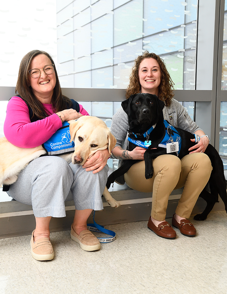 Carrie Potter with Yoda (left) and Molly Trippe-Gallagher with Rosie.