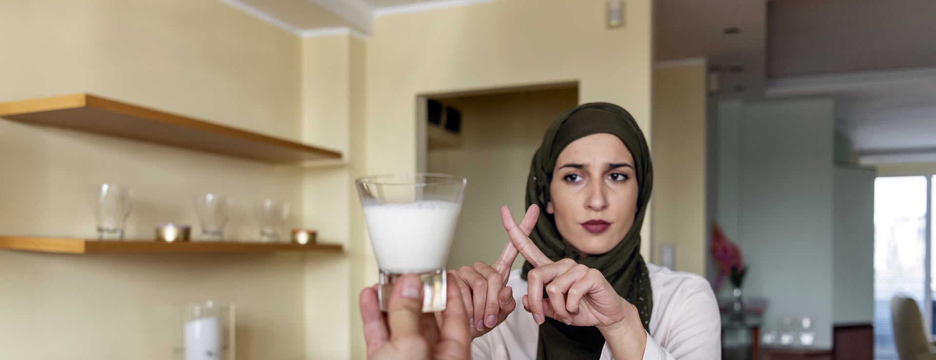 Woman rejecting milk