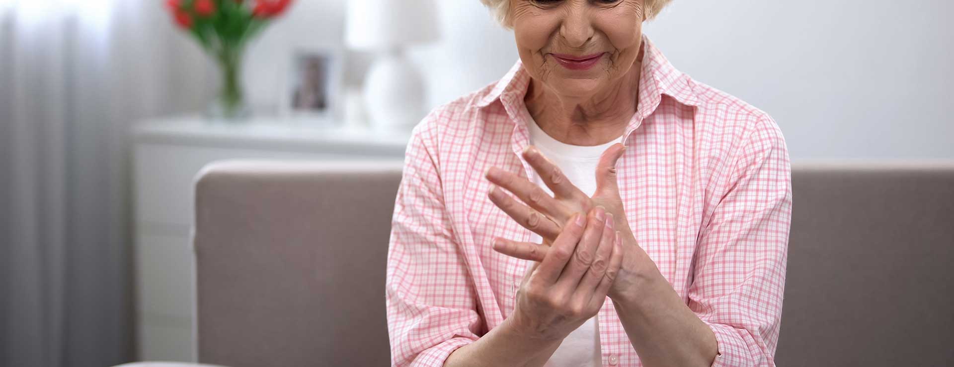 Women experiencing pain from osteoarthritis in hand