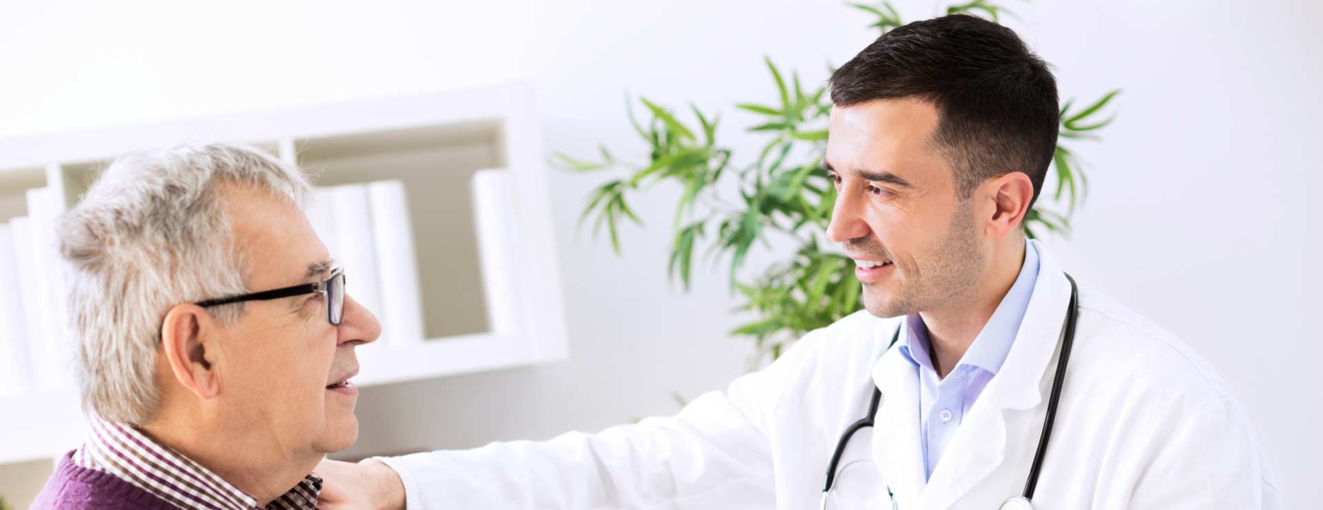Doctor reassuring older man