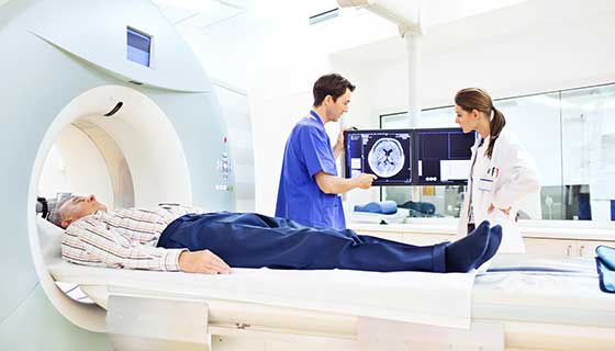 Doctor discussing CT scan