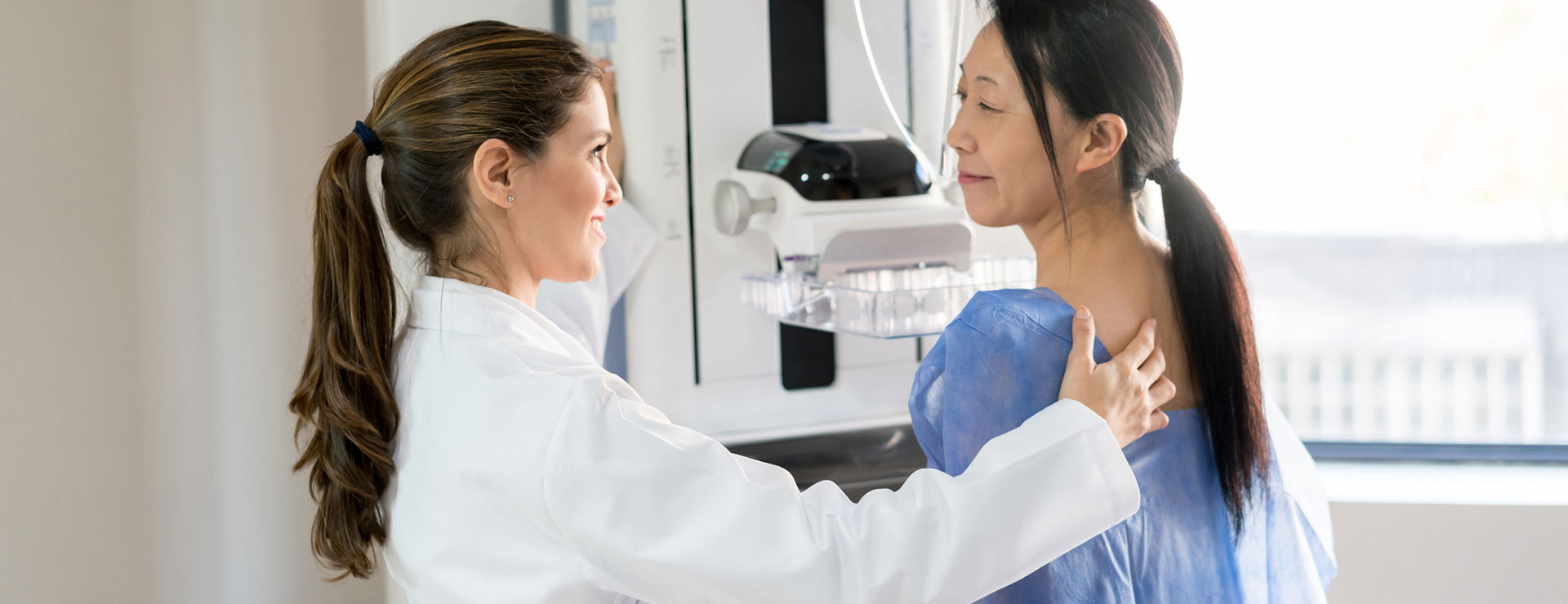 a woman getting a mammogram