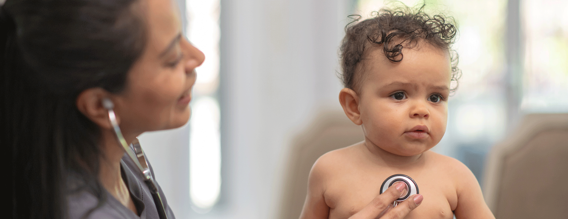 Young child has heart checked by doctor