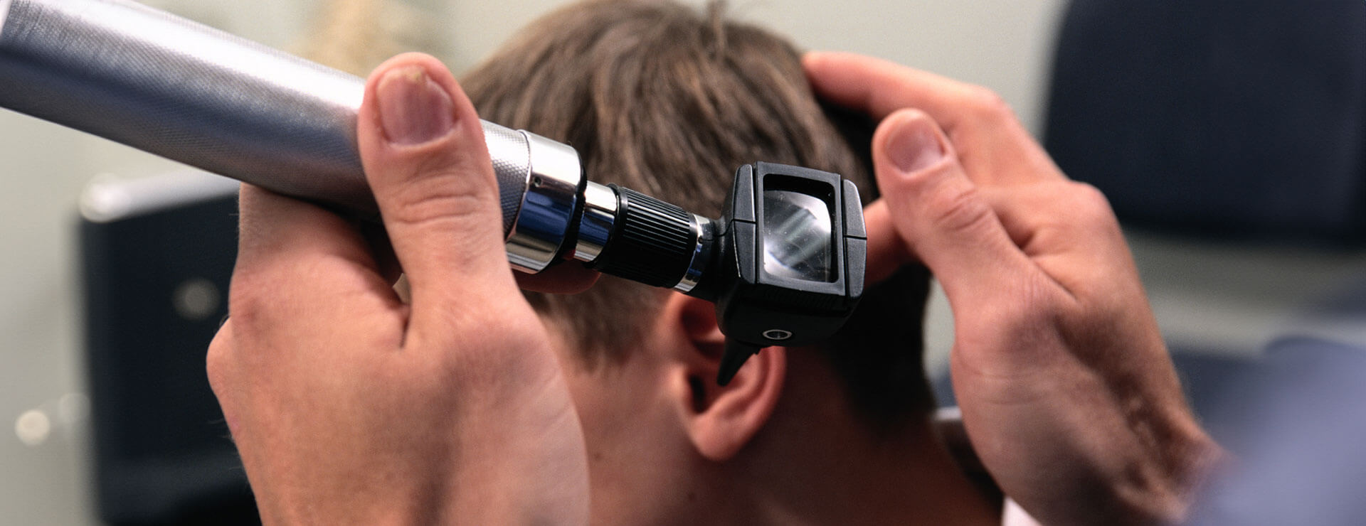 doctor examining child for cholesteatoma 