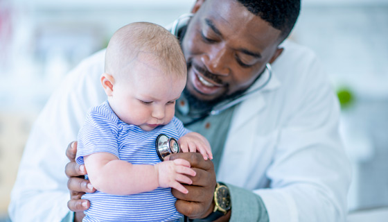 Pediatric provider with a baby