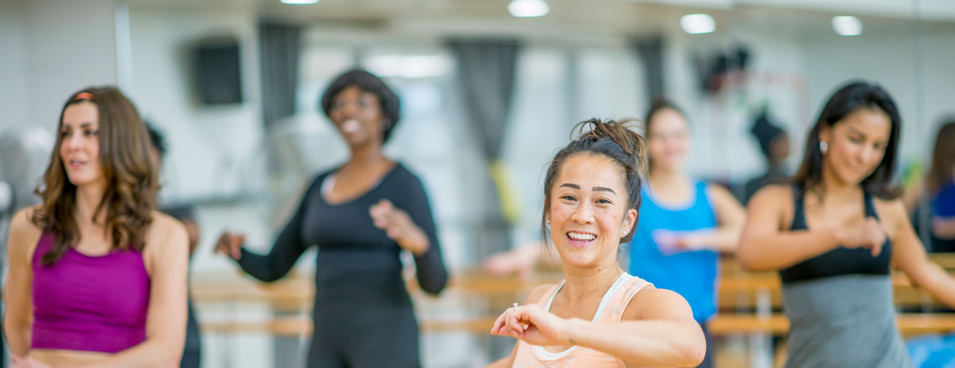 Group taking a dance fitness course