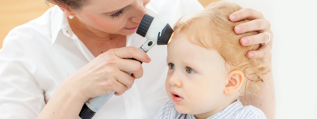 dermatologist checking baby's skin