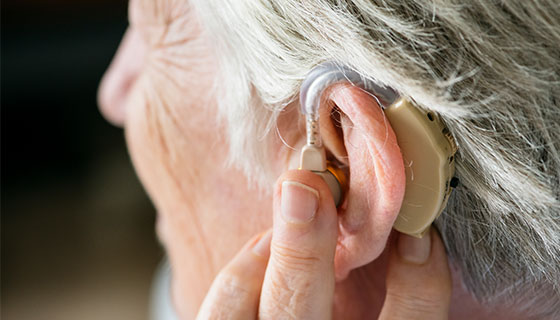 woman with a hearing aid