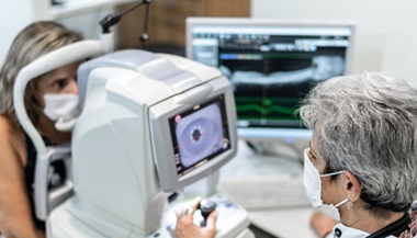 doctor provides eye exam to a patient who may have stevens johnson syndrome