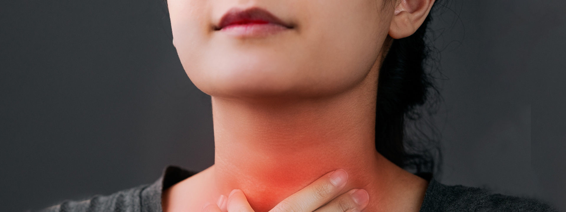 woman with sore throat