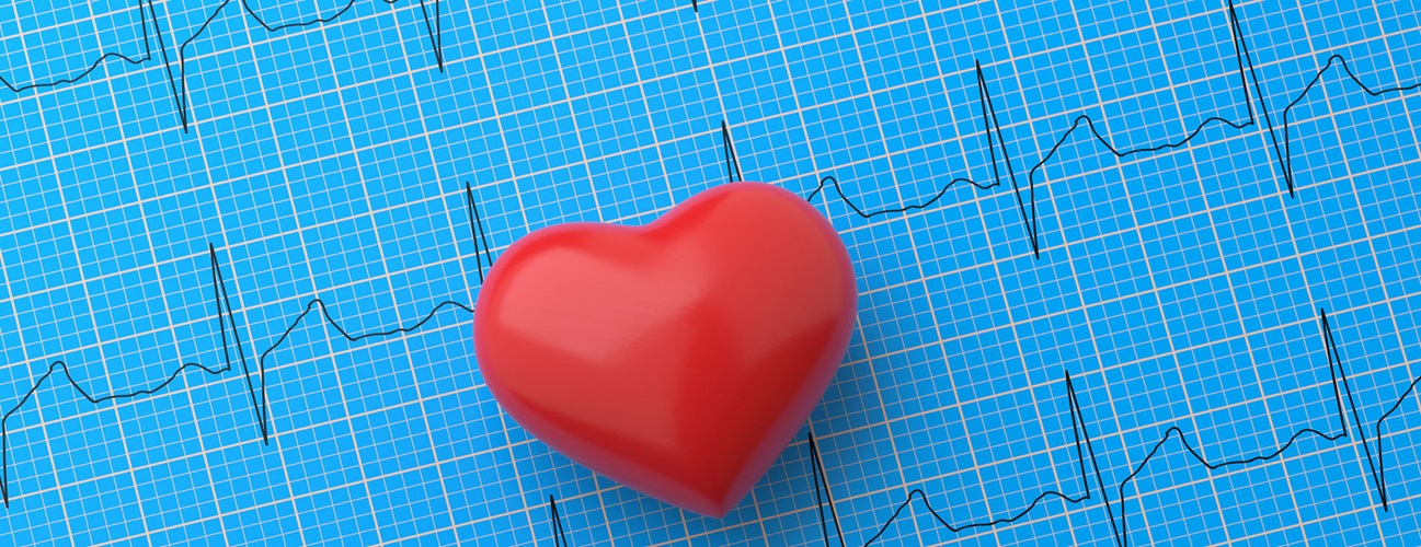 Heart stress ball on top of heart rhythm patterns