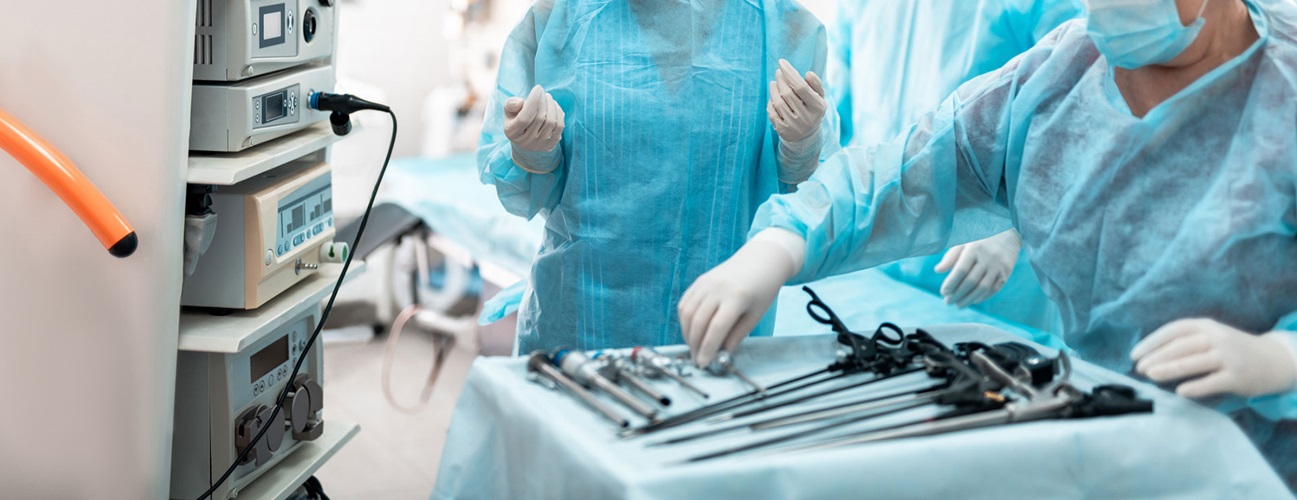 a medical team preps for laparoscopic surgery