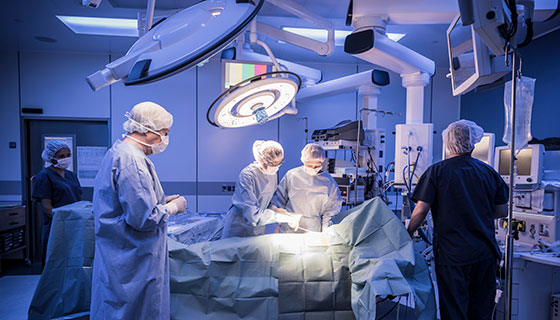 a medical team in an operating room performing surgery