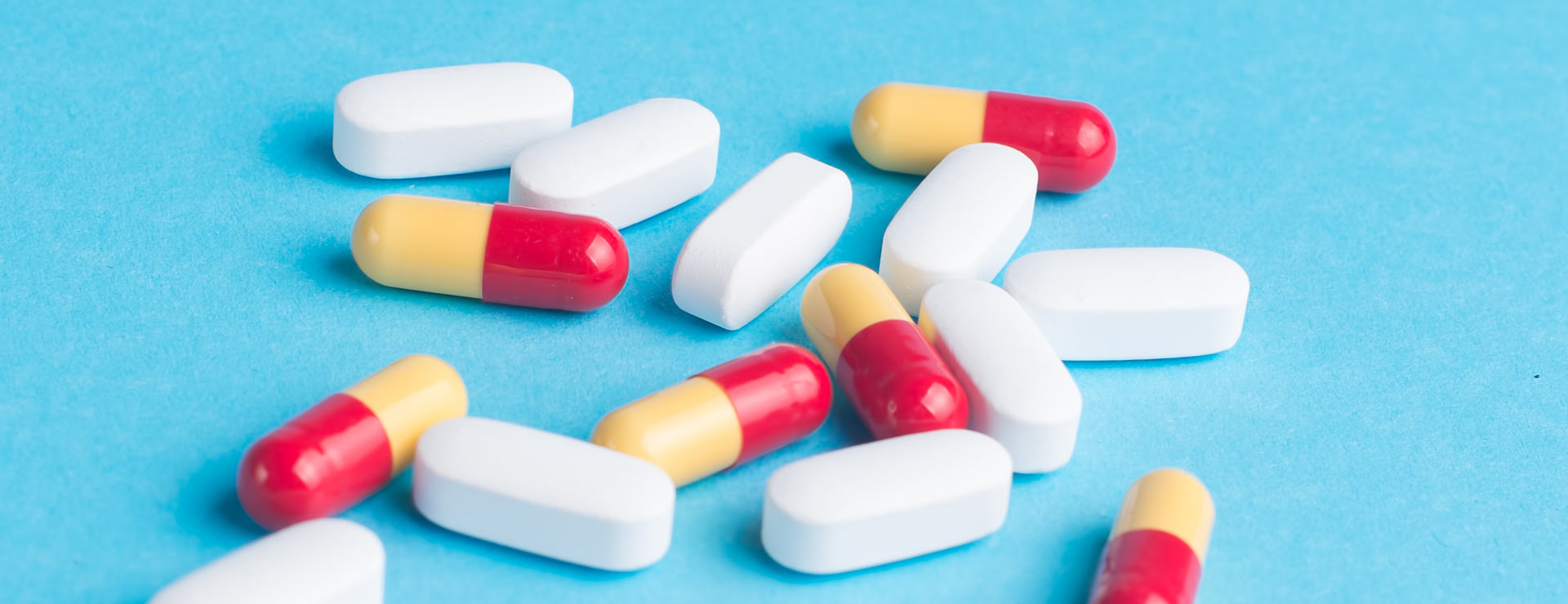 An array of medications sitting on a surface