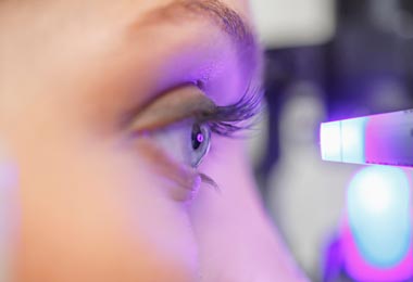 Closeup of an eye during an eye exam