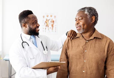 Doctor conversing with overweight patient