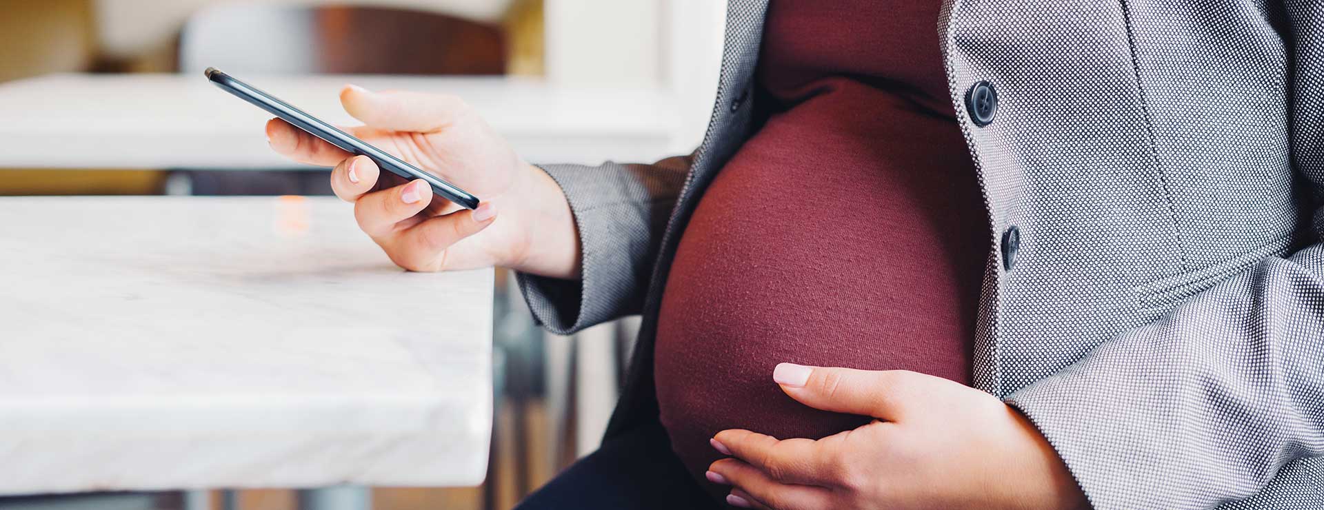 Woman scrolling through her phone