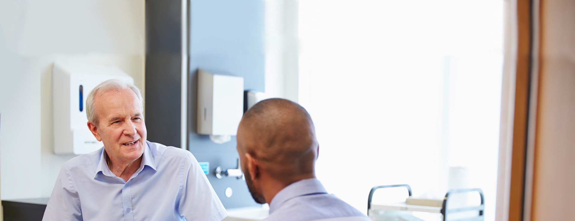 Senior man and doctor consultation