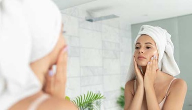 woman going through skin care routine