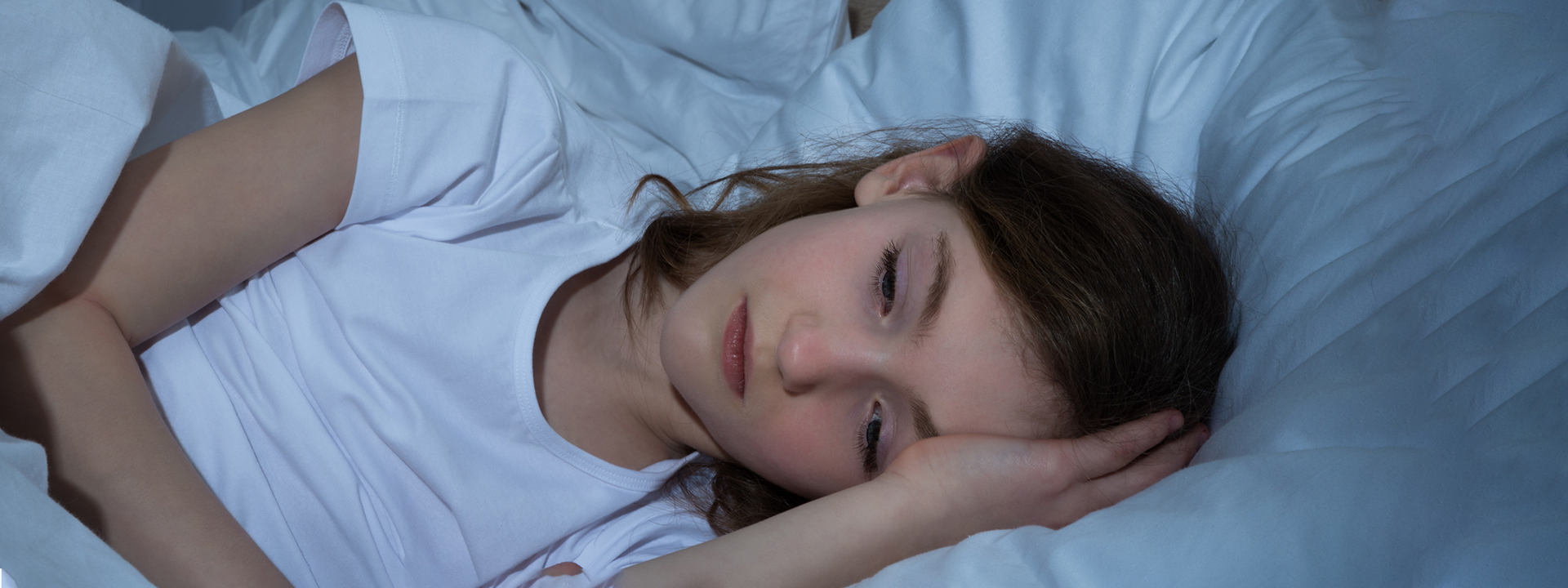 girl having difficulty sleeping