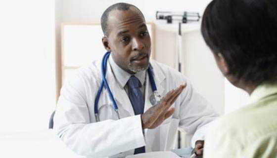 Doctor talking with patient