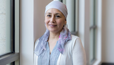 Woman with cancer wearing a head scarf