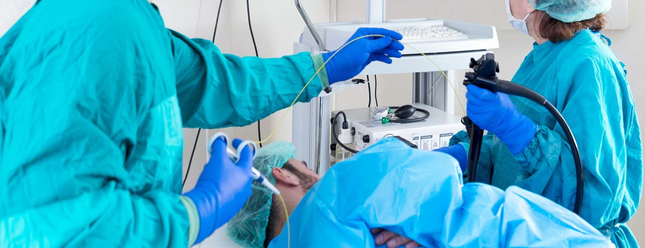 Surgeons performing an endoscopic procedure