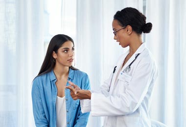 Young woman in a consultation with a doctor