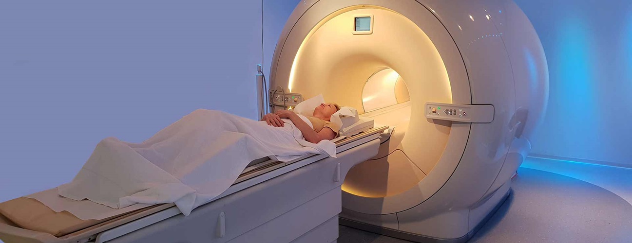 A patient undergoes a CT scan.