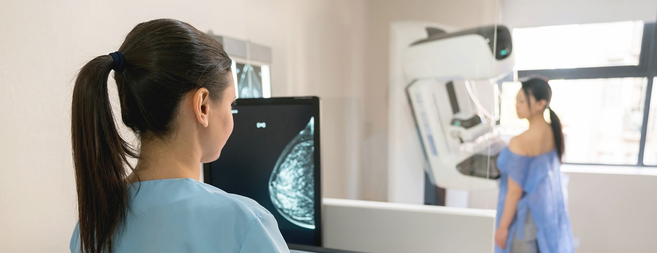 woman receiving a mammogram
