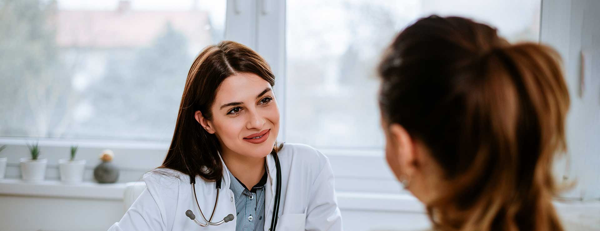 doctor with female patient