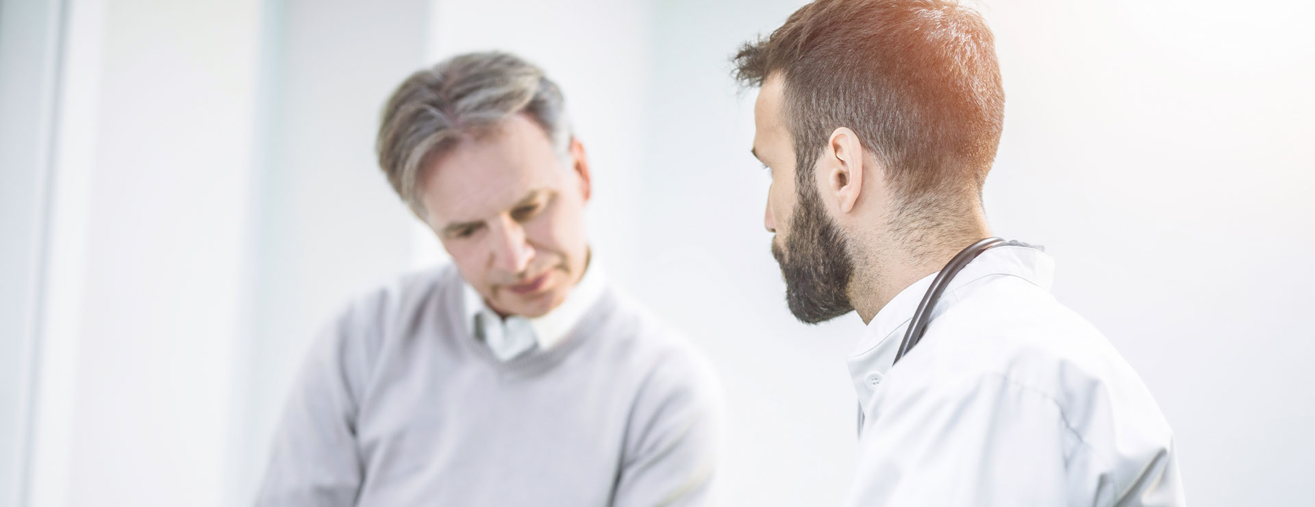 man with doctor at a consultation
