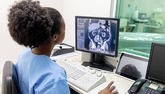 doctor reviews scans