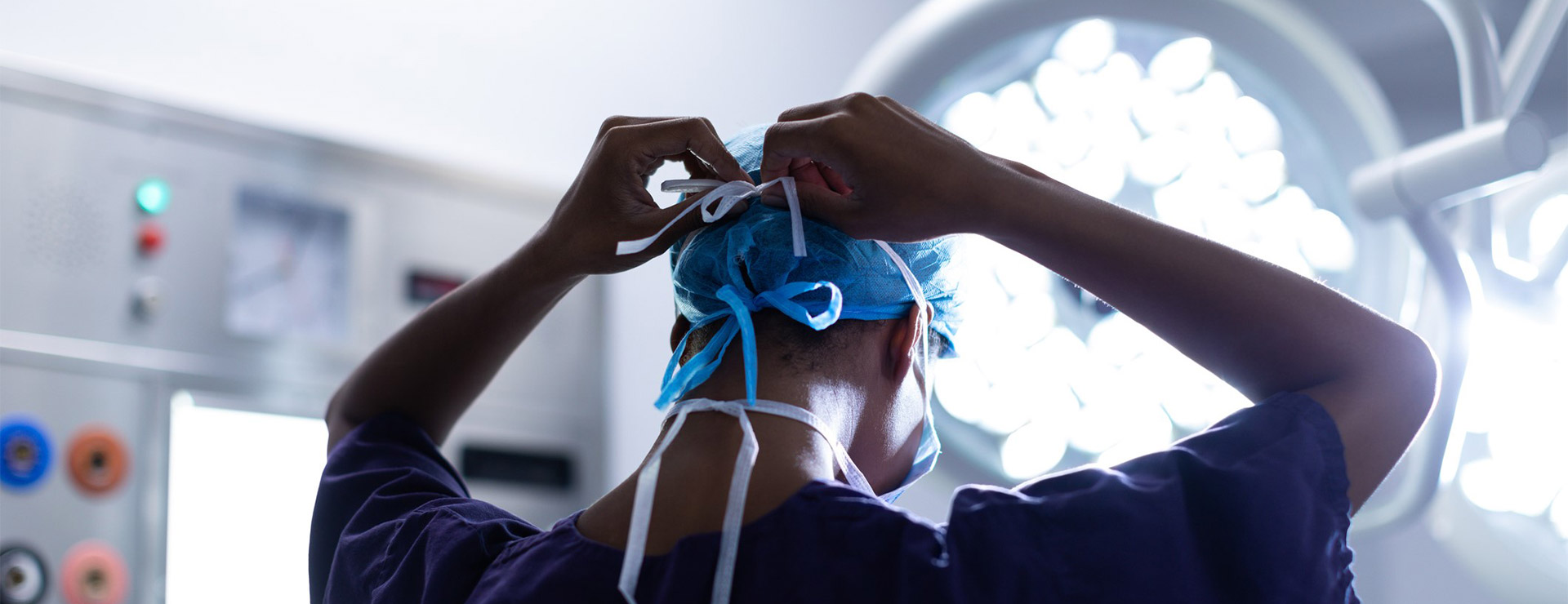 Surgeon preparing for procedure.