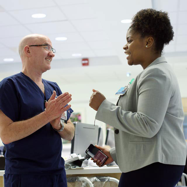 Health care workers discussing