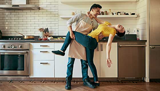 Couple dancing in the kitchen