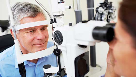 Older man undergoing an eye exam