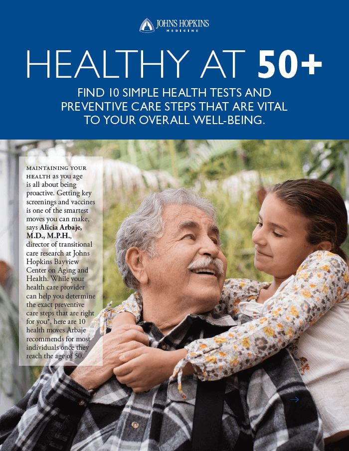 The cover of the Healthy at 50-plus guide, featuring a young girl hugging her grandfather.