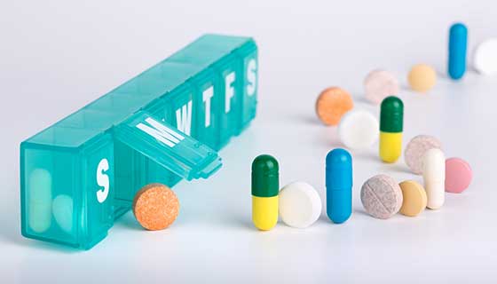Pill organizer and a line of pills